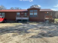 3/2 large home in Kerrville on Town Creek frontage! Great 30 ft front porch.