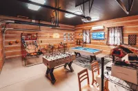 Modern luxury 4 Bedroom cabin with game room, hot tub, sauna and home theater