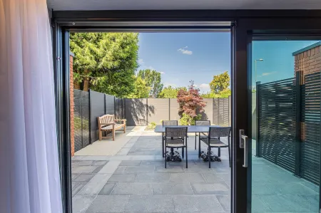 The Fellows House Mews Отели рядом с достопримечательностью «Колледж Кембридж Маслим»