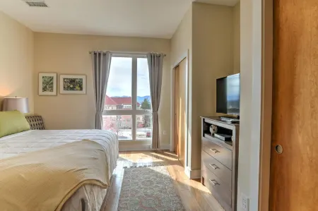 Charming Condo with Balcony and Parking - Modern City Oasis