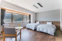 Business Hotel Izukura Hotels near Takatama Station