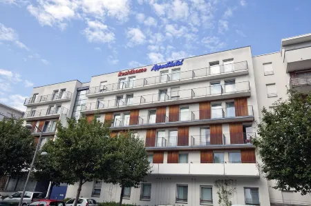 Residhome Nancy Lorraine Отели рядом с достопримечательностью «Basilique Notre-Dame-de-Lourdes»