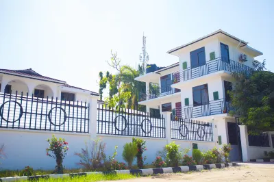 Mikocheni Condo Hotel & Apartments Hotels near INUKA UANGAZE (Arise & Shine Ministry)