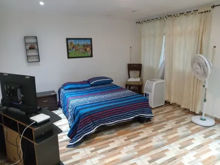 Linda Casa Vacacional Andy-Santiago de Cali Отели рядом с достопримечательностью «Cali Zoo»