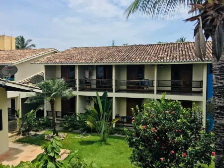 Sueds Premium Отели рядом с достопримечательностью «Coroa Vermelha Beach»