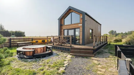 Domek Freedom Sun & Snow with Sauna and Jacuzzi Отели в г. Волин