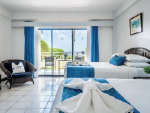 Tropikist Beach Hotel & Resort Hotels near A.N.R. Robinson International Airport