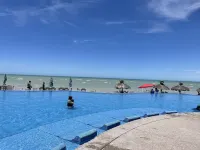 Oceanfront ground level condo on a Private Beach in a lovely resort! - piscina