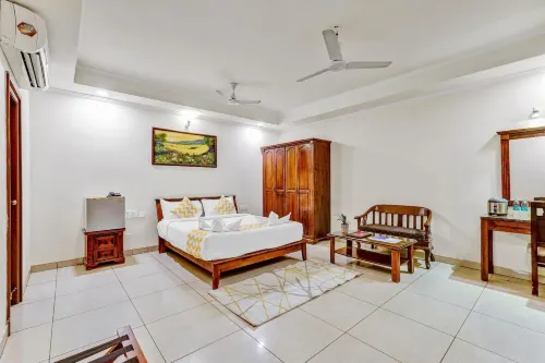 Blossoms Hotel and Service Apartment