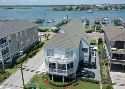 Soundfront on Banks Channel with private pier and boat slips