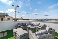 Private Rooftop Steps to the Beach Chic Design Seaside Style by AvantStay