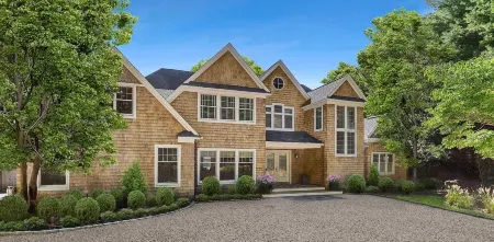 East Hampton Designer home close to Village with heated pool.