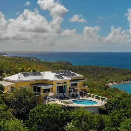 Home with panoramic views with access to private beach!