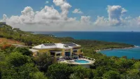 Home with panoramic views with access to private beach!