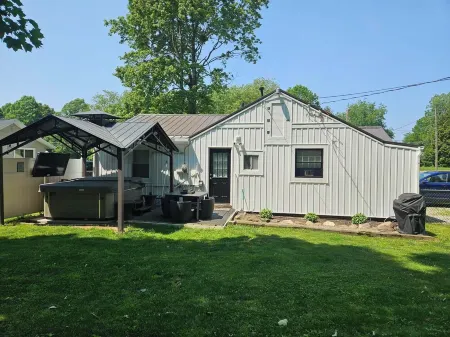 The White House w/ Hot Tub Portage Lakes Fenced Yard Pet-Friendly!