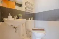 2BR Apartment Connected to Mall at Cinere Bellevue Suites By Travelio