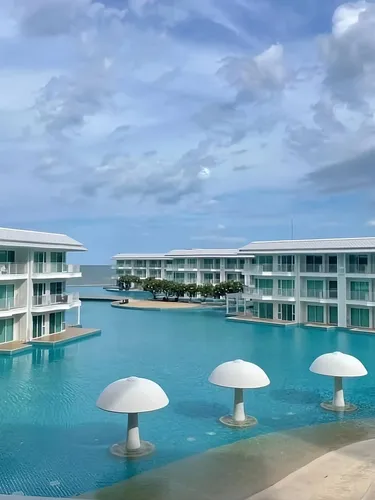 รูปภาพของModern 2-Bedroom Condo with Ocean and Pool Views in Cha-am