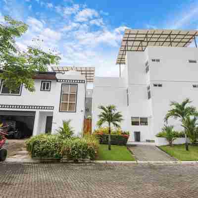 Steps from beach with private pool, rooftop terrace & swim up bar beach club! Hotel Exterior