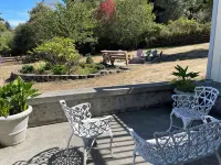 The Garden Suite has beautiful views of forests and pastures! It is dog friendly - Wifi