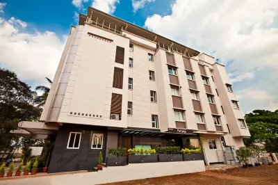 Mallige Residency Hotels near RAJALAKSHMI. TRADERS