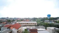 New Studio Apartment with Strategic Location at Suncity Residence By Travelio