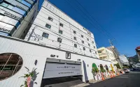BUTTON HOTEL 梁山體育綜合體