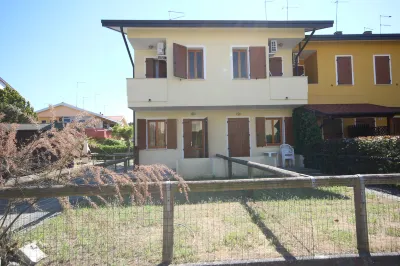Relax in our villa with private garden in Rosolina