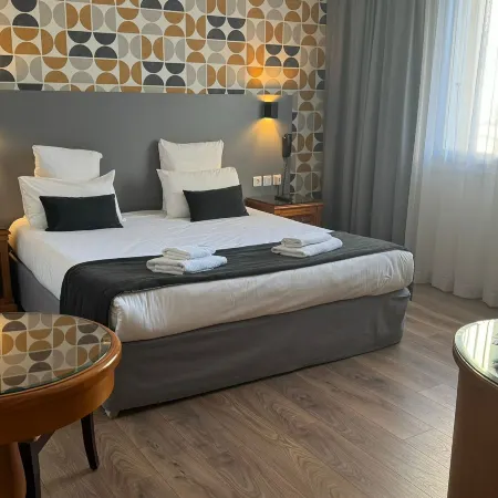 Hotel le Bourgogne Отели рядом с достопримечательностью «Железнодорожный вокзал Эвиан»