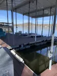 Lakefront pet-friendly home/private dock with boat slip and two place PWC lift.