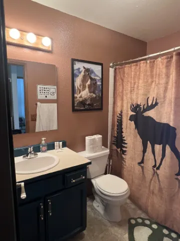 One Bedroom Top Floor Condo with Mountain View from Bedroom and Covered Parking