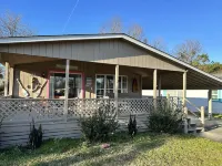 Coastal cottage minutes from the beach.  Large front porch for morning sun!!