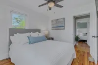 Waterfront retreat with dock, kayaks, and outdoor living. Bring the boat!