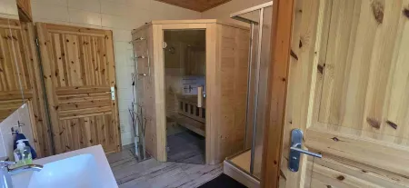 Large wooden house with sauna, in a quiet location by the bathing lake