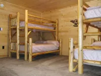 3BR 2 Bath house with full kitchen, living room, and hot tub.