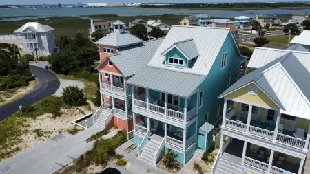 Oceanside Home with water views with community Pool in Dunes and close to beach.