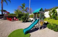 Oasis Pool • Private Resort • Guesthouse Game Room