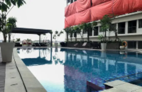 Comfortable Pool View Studio Room at LRT City Jatibening Apartment