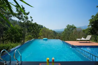 Amrezy Resort and Spa by Stride Wayanad Hotels near Kakkadampoyil.hills view vythiri