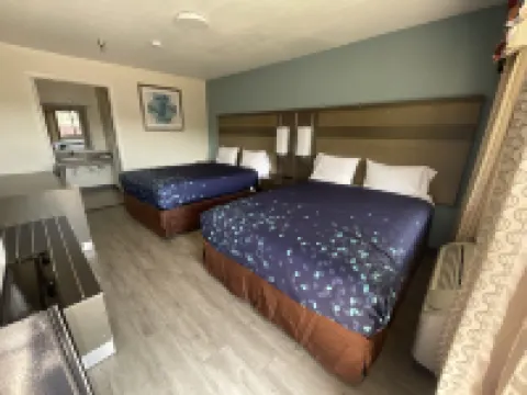 เอ็กซีคิวทีฟ อินน์ แอนด์ สวีตส์