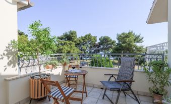 Beachfront Apartment with Balcony and Parking