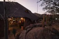 Huab Lodge & Bush Spa Hotels near Rock Engravings at Peet Alberts Koppie