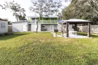 Spacious Fenced Backyard and Cozy Living Area - Charming Escape