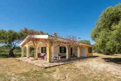 Lovely cottage with private wide garden near Orosei