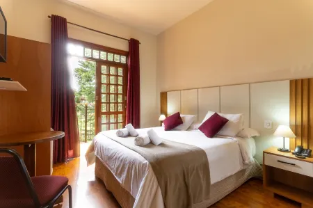 Pousada la Toscana Campos do Jordão Отели рядом с достопримечательностью «Casa - Chalé Condomínio Estância das Águas Claras»