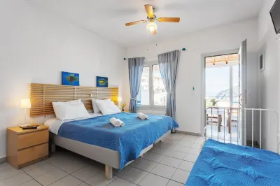 Thea Home Hotel by Booking Kottas Hotel di 