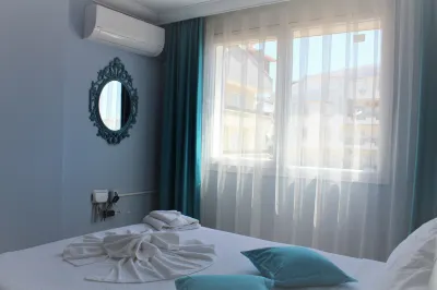 Mavi Restaurant & Apartments 1 Hotels near BEKTAS TICARET SOKE UN BAYII