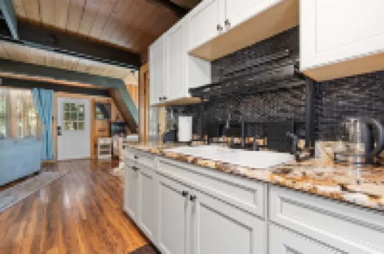 Cozy Cabin with Hot Tub and Fire Pit - Unique Coastal Retreat