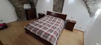 Finely renovated two-room apartment with typical stone vaults.