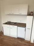 Cozy apartment near the university: with double bed, kitchenette and bathroom