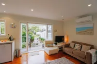 Delightful elevated sunny S/C Studio Hotels in Whangamata